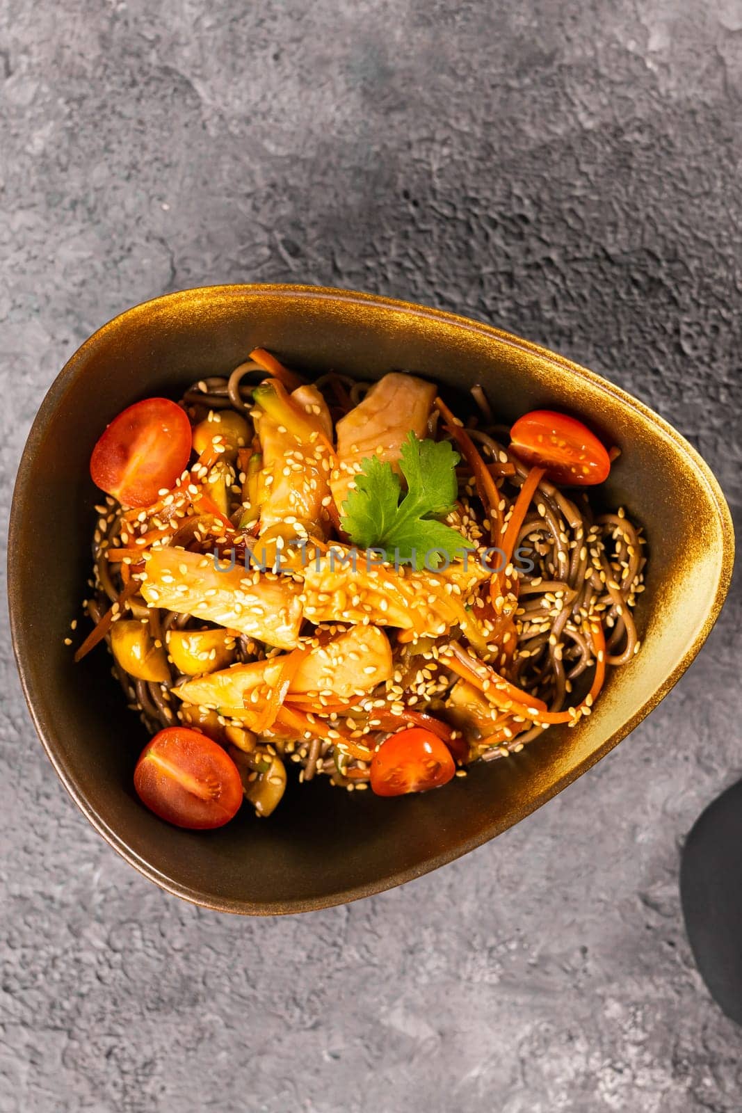 Udon stir-fry noodles with salmon and vegetables. Asian cuisine by Satura86