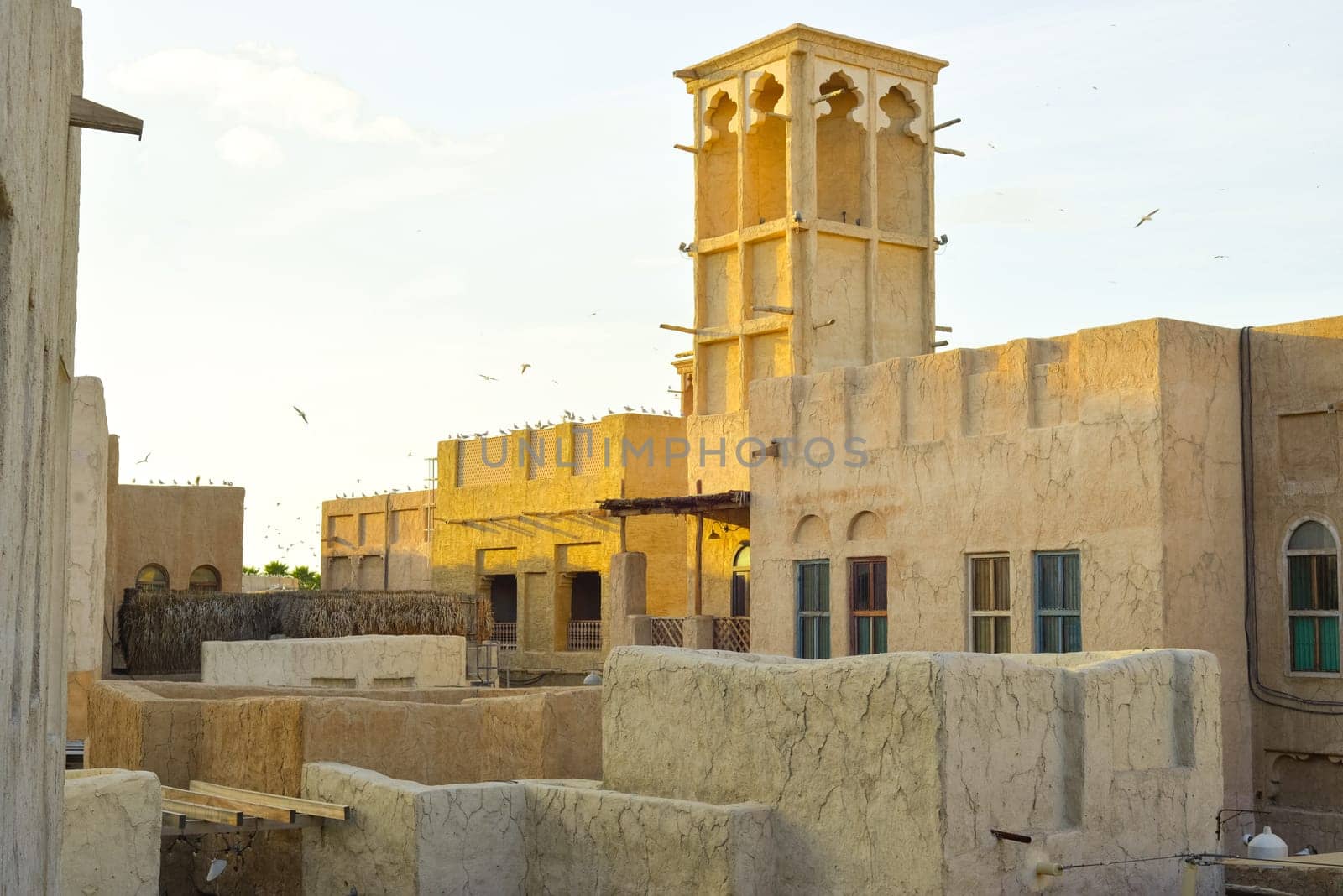 Dubai, UAE. Buildings and houses of traditional historical architecture of the old city of the Emirates in the Persian Gulf. The clay houses of Al Sifa. Deira, Burdubai. by Ekaterina34