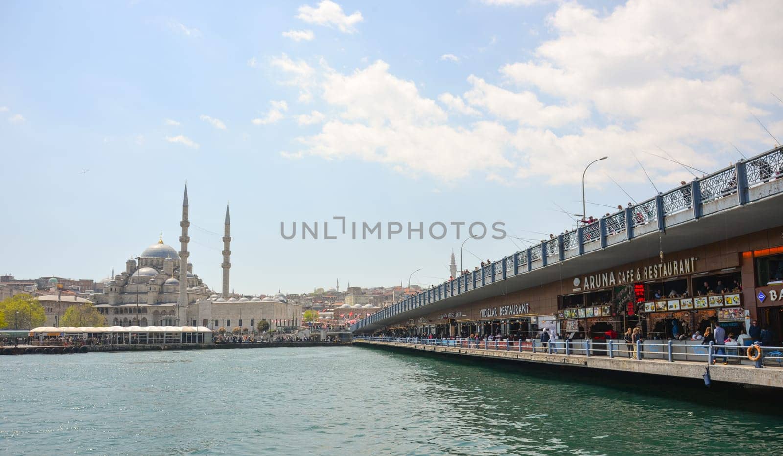 Istanbul, Turkey, May 02, 2023: View of the mosque in cloudy weather over the Bosphorus and Kadika