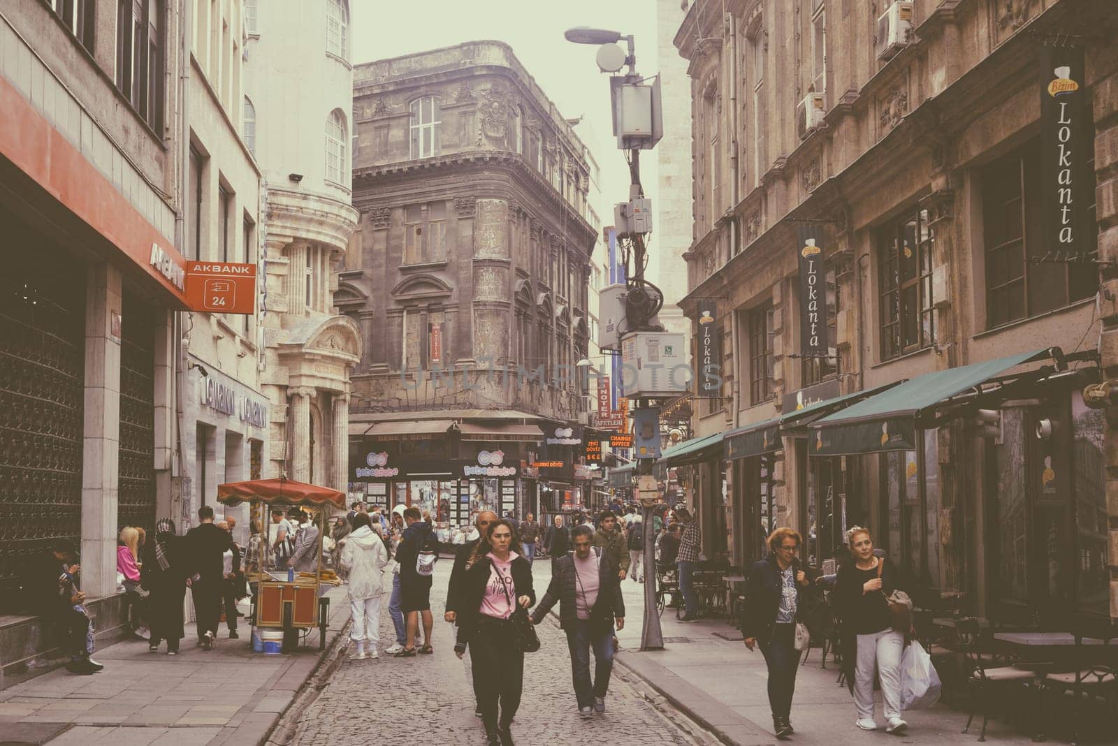 Istanbul, Turkey, May 02, 2023: People walk through the historical streets of Istanbul