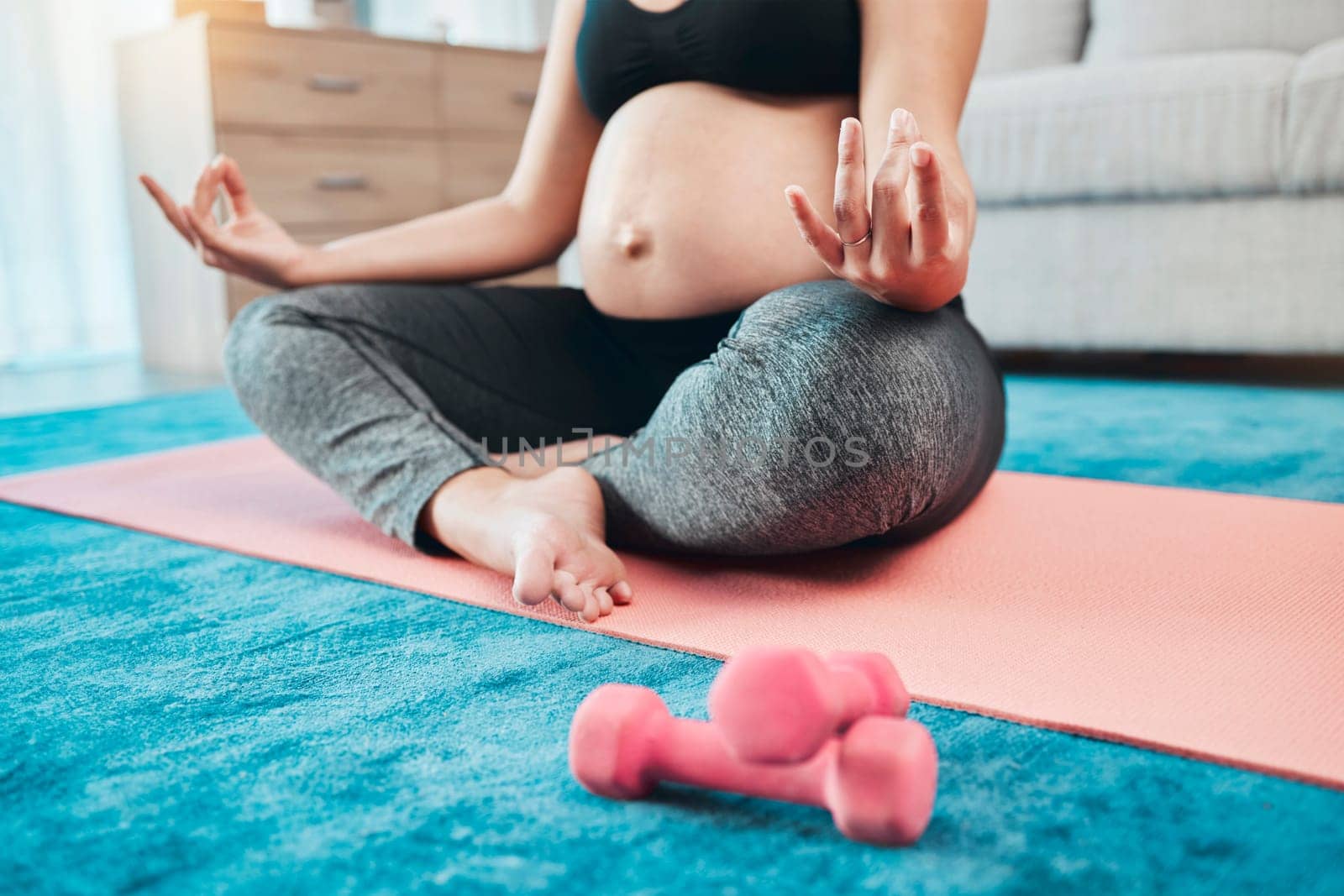 Yoga, pregnant woman and meditation in living room, wellness or health. Pregnancy, female or lady with peace, zen and calm to relax, fitness and training in lounge with dumbbells, workout or exercise.