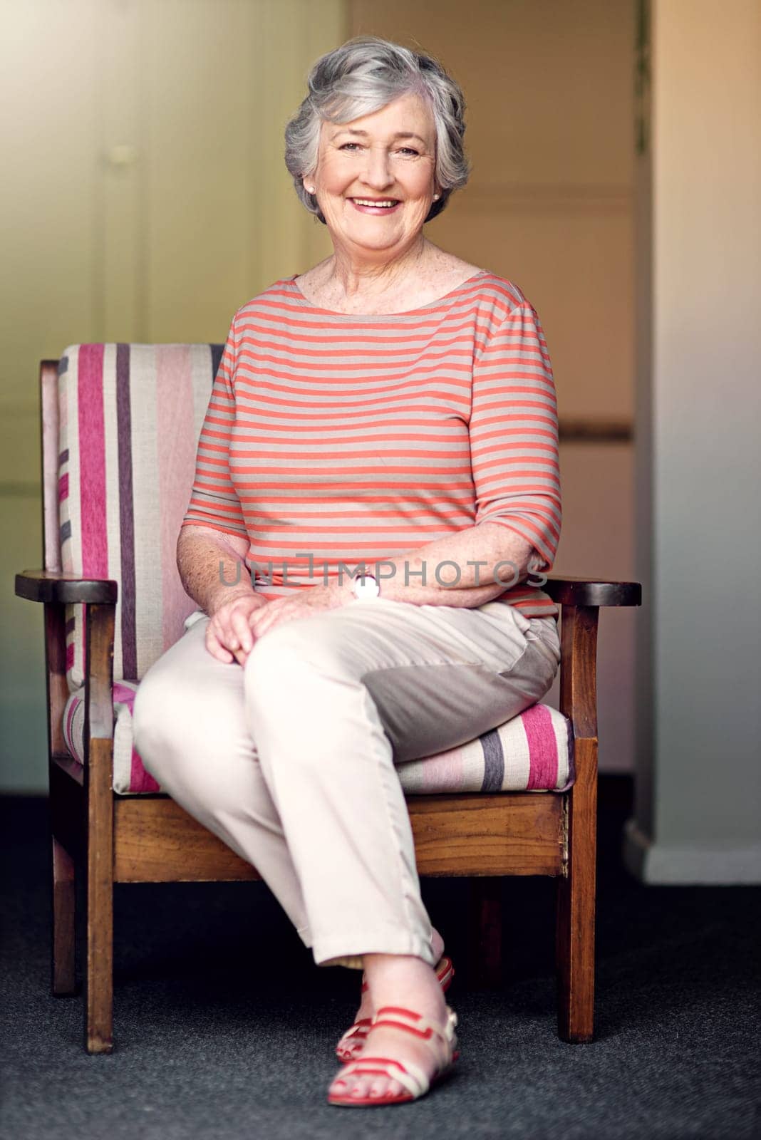 Old people were young people before young people were people. Shot of a senior woman relaxing at home. by YuriArcurs