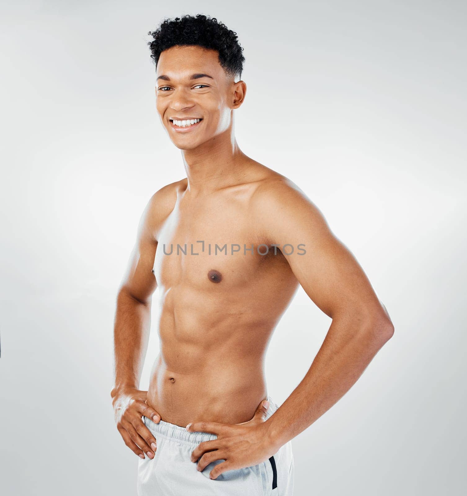Fitness, health and a portrait of topless man with muscles, mindset and motivation for sports workout. Exercise, gym and a bodybuilder with smile on face, growth and healthy body for happy lifestyle