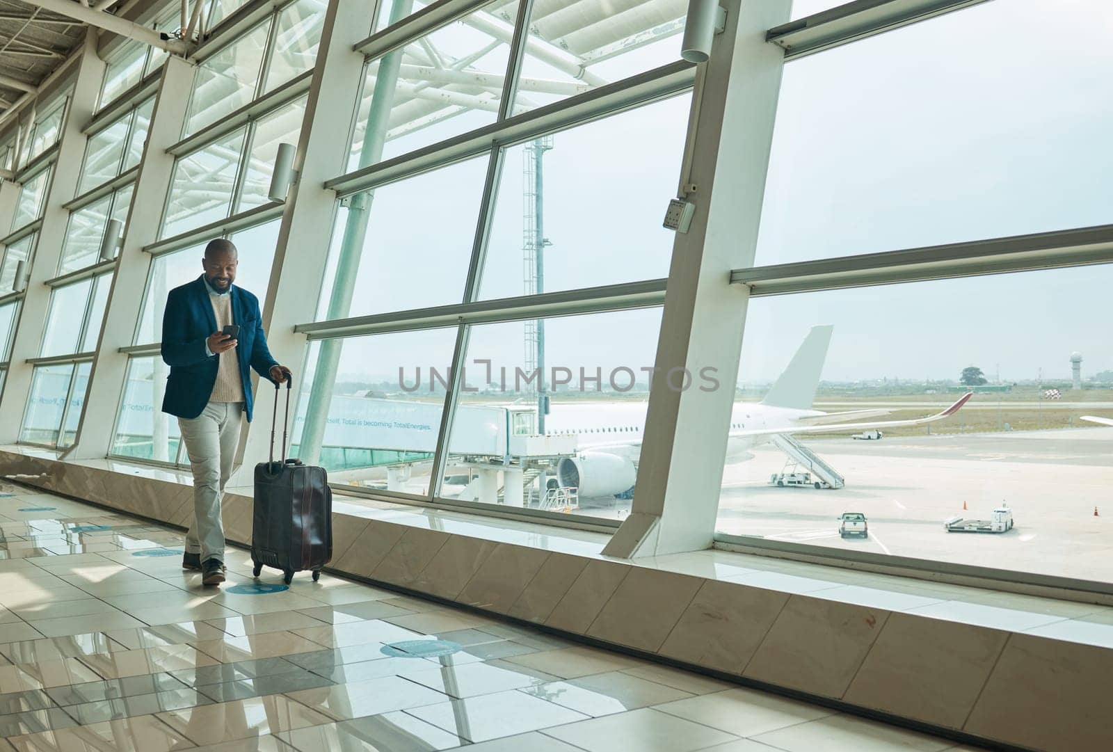 Airport travel, phone or black man walking to airplane, flight booking or corporate transportation journey. Luggage suitcase, plane departure or typing businessman contact online user on holiday trip by YuriArcurs