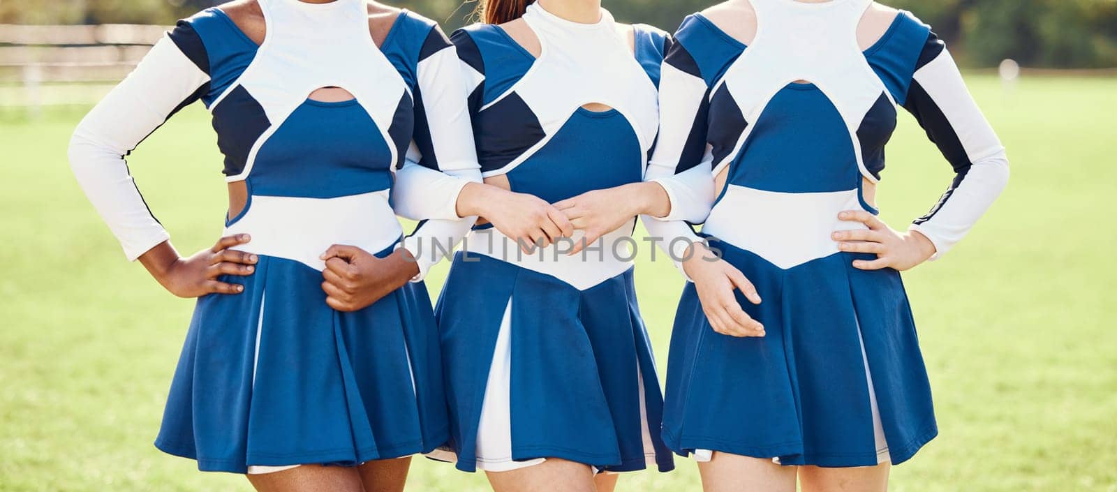 Cheerleader, teen girl team and outdoor, athlete and fitness with squad in uniform and support. Exercise, competition and school event, collaboration and female with sports, teamwork and cheerleading.