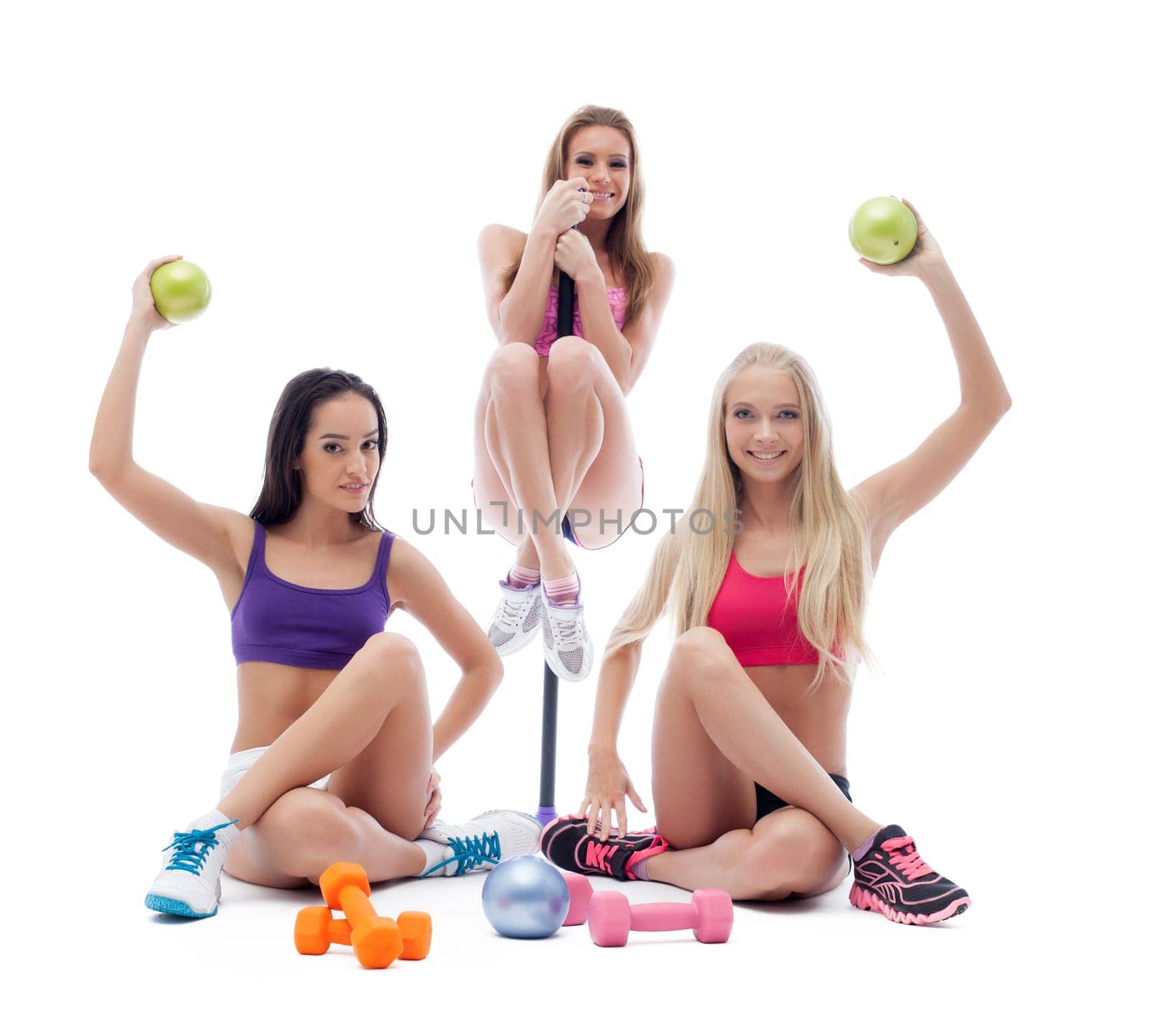 Funny sportswomen posing with sports equipment by rivertime