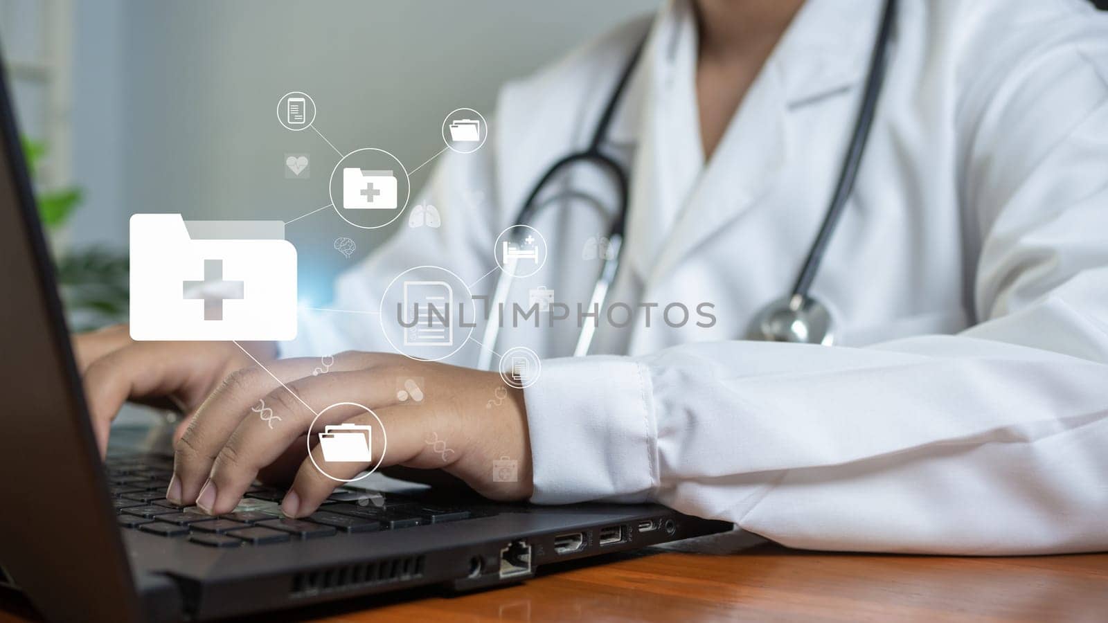 Doctors use  computer to research medical information. medical concept. by Unimages2527