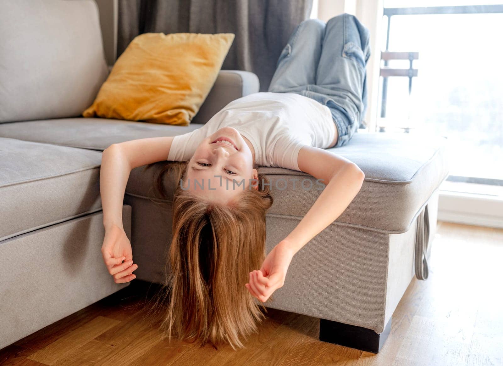 Preteen girl lying on sofa and posing by tan4ikk1