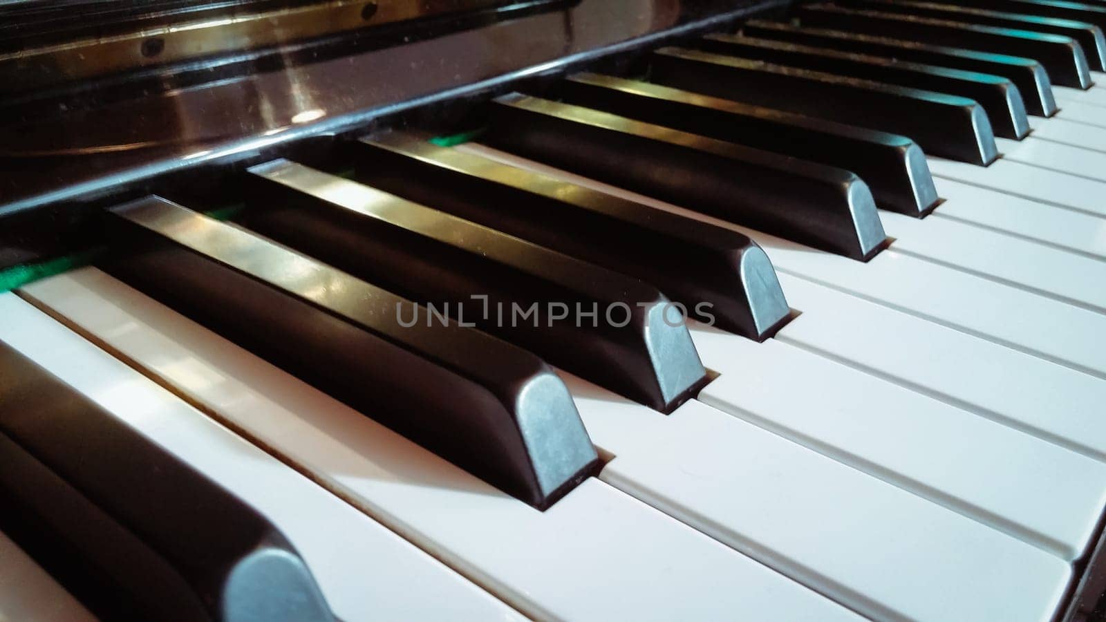 Close up of piano keys. Side view