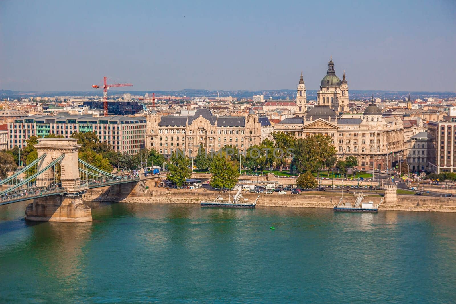 Budapest cityscape, including chain bridge, St Stephen's Basilica, Ministry of the Interior, the Four Seasons Hotel and the Danube river in Budapest, Hungary
