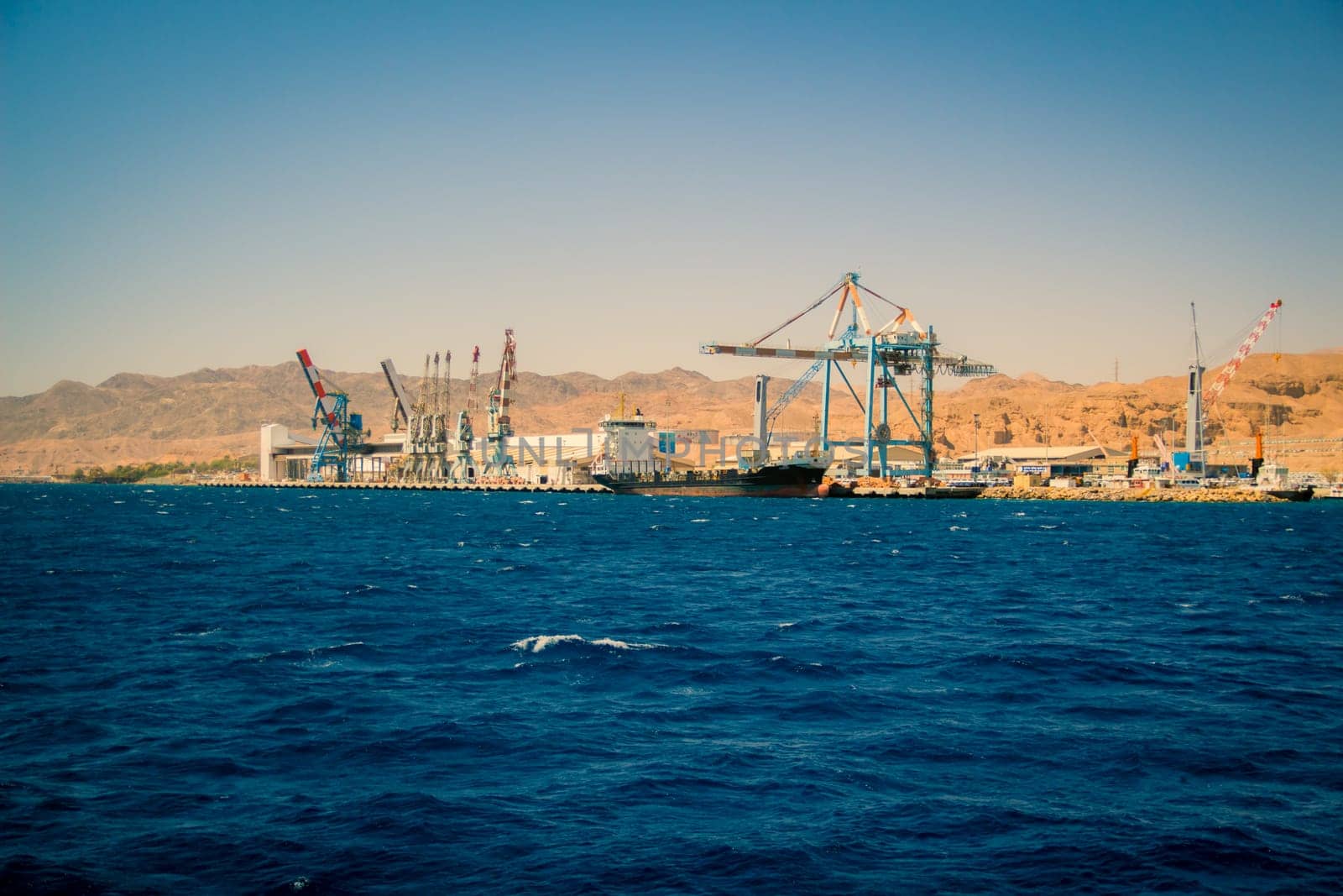 Port of Eilat, Israel.
A cargo ship docked in the port.