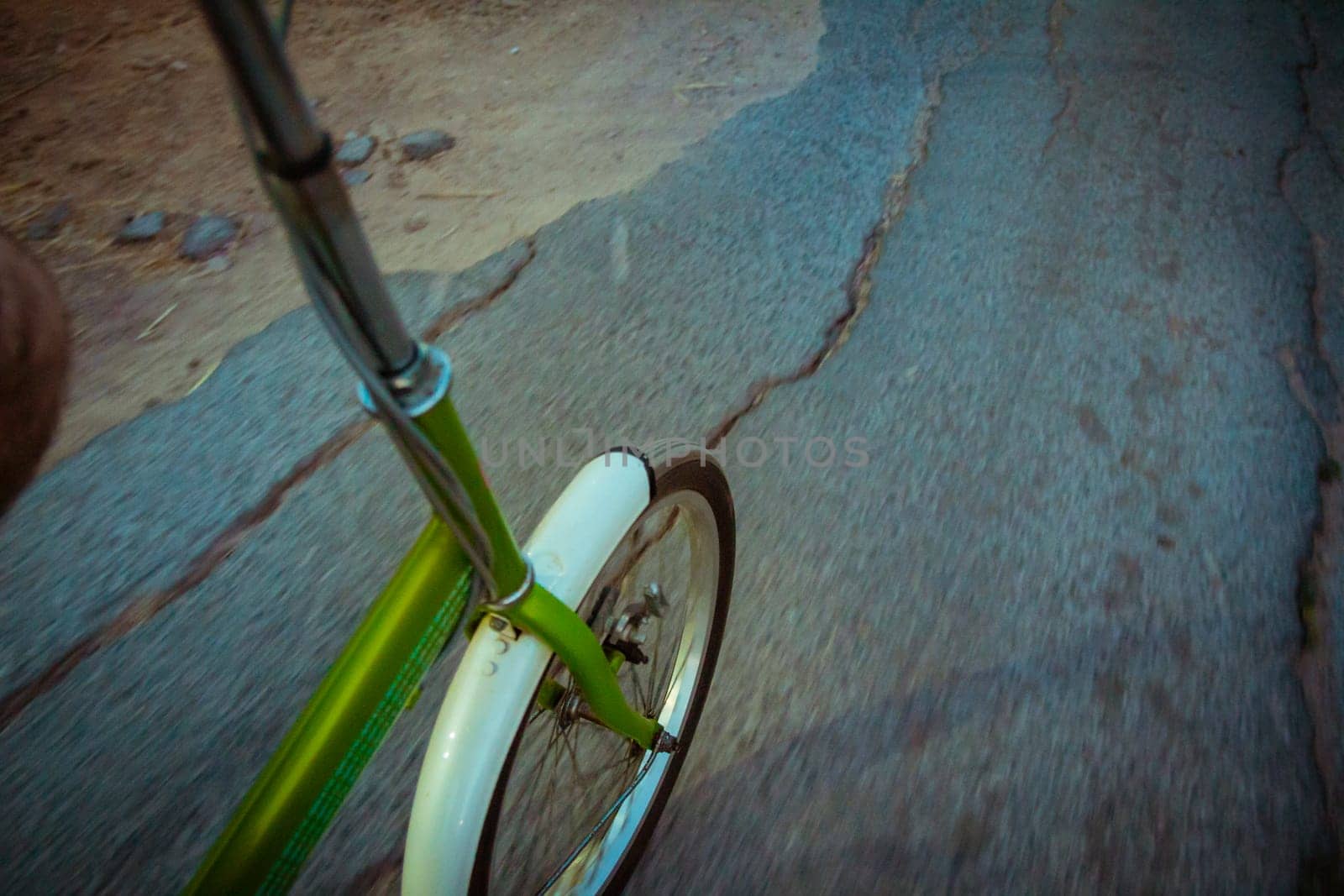 Riding a bike on the road. Original point of view (POV).