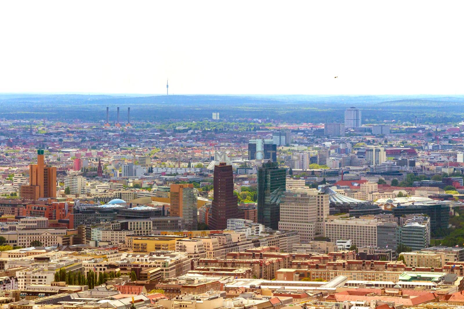 Aerial view of Berlin skyline with colorful buildings.