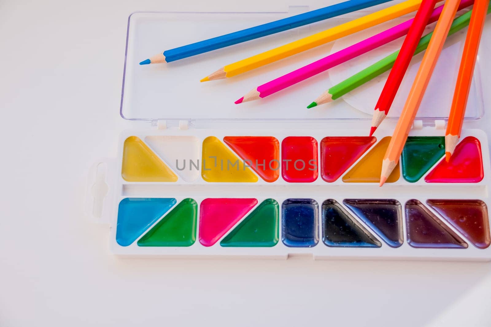 Composition with school accessories for painting and drawing.