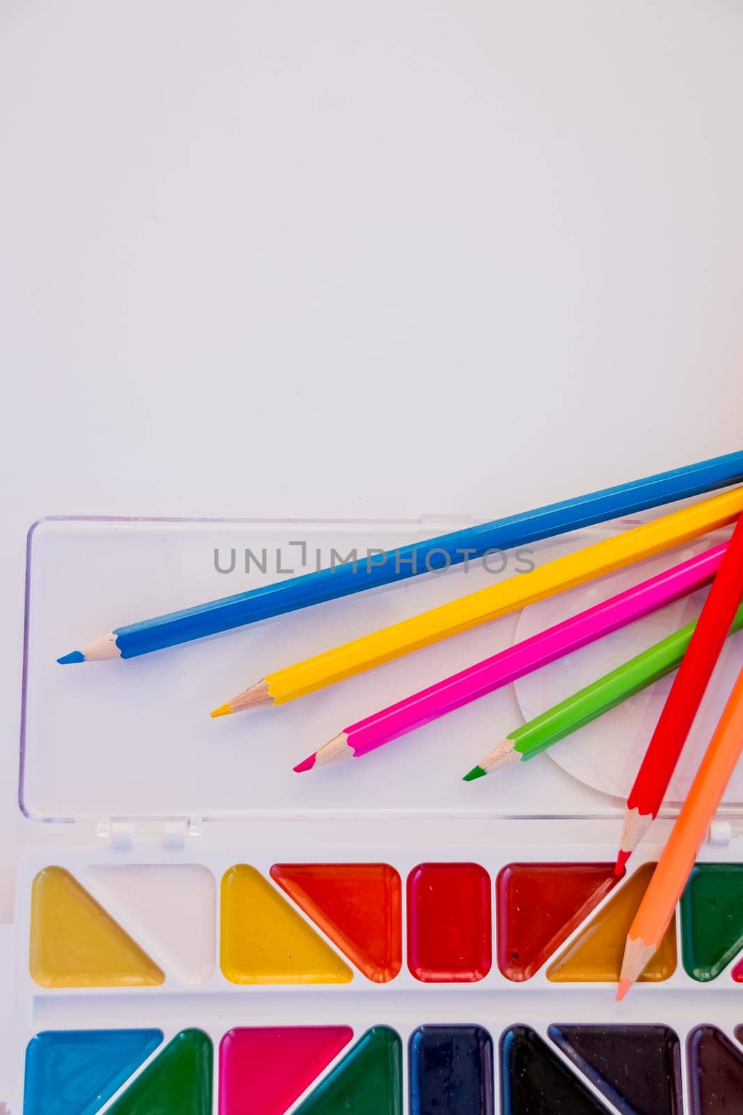 Composition with school accessories for painting and drawing.