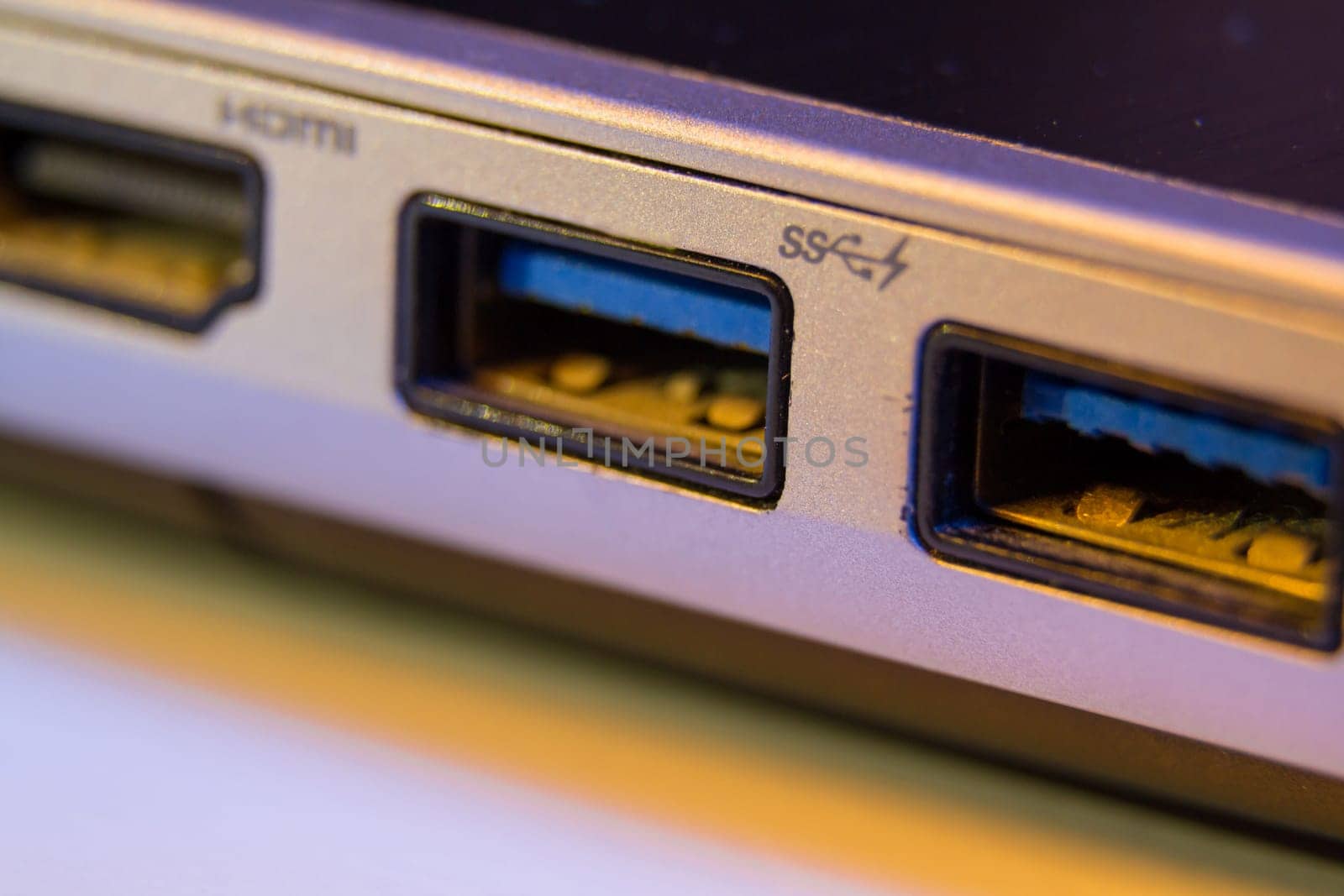 Closeup of fast blue USB 3 ports in a laptop.