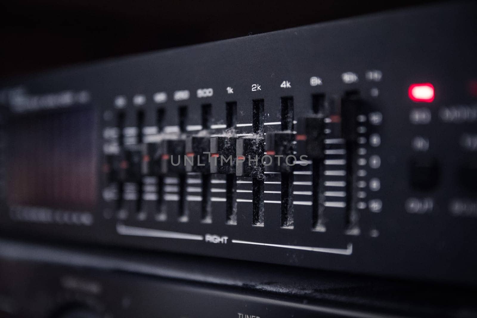 Graphic equalizer controls on an audio system - Close Up Selective Focus
