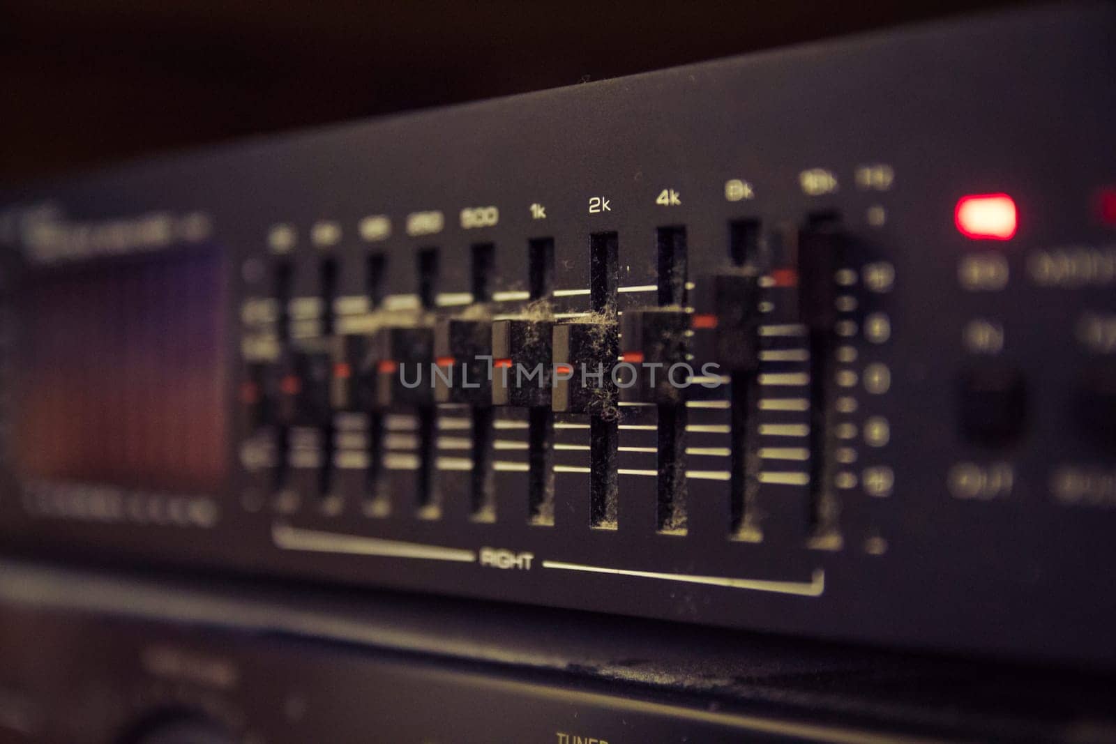 Graphic equalizer controls on an audio system - Close Up Selective Focus
