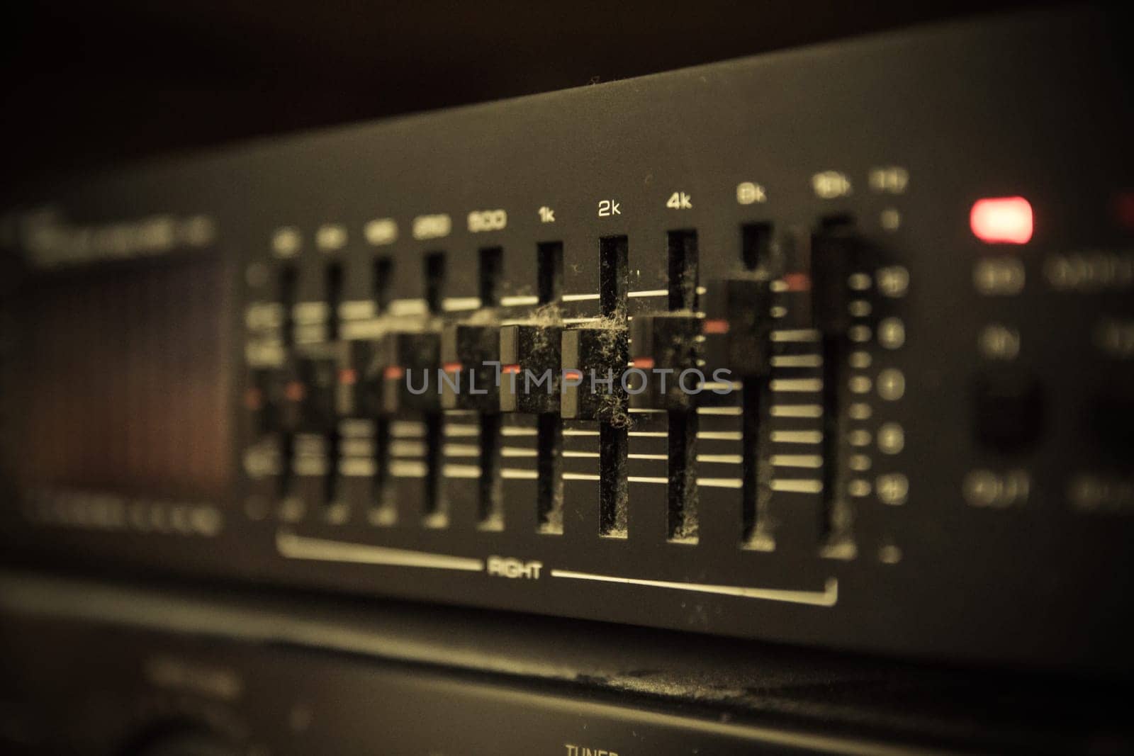 Graphic equalizer controls on an audio system - Close Up Selective Focus
