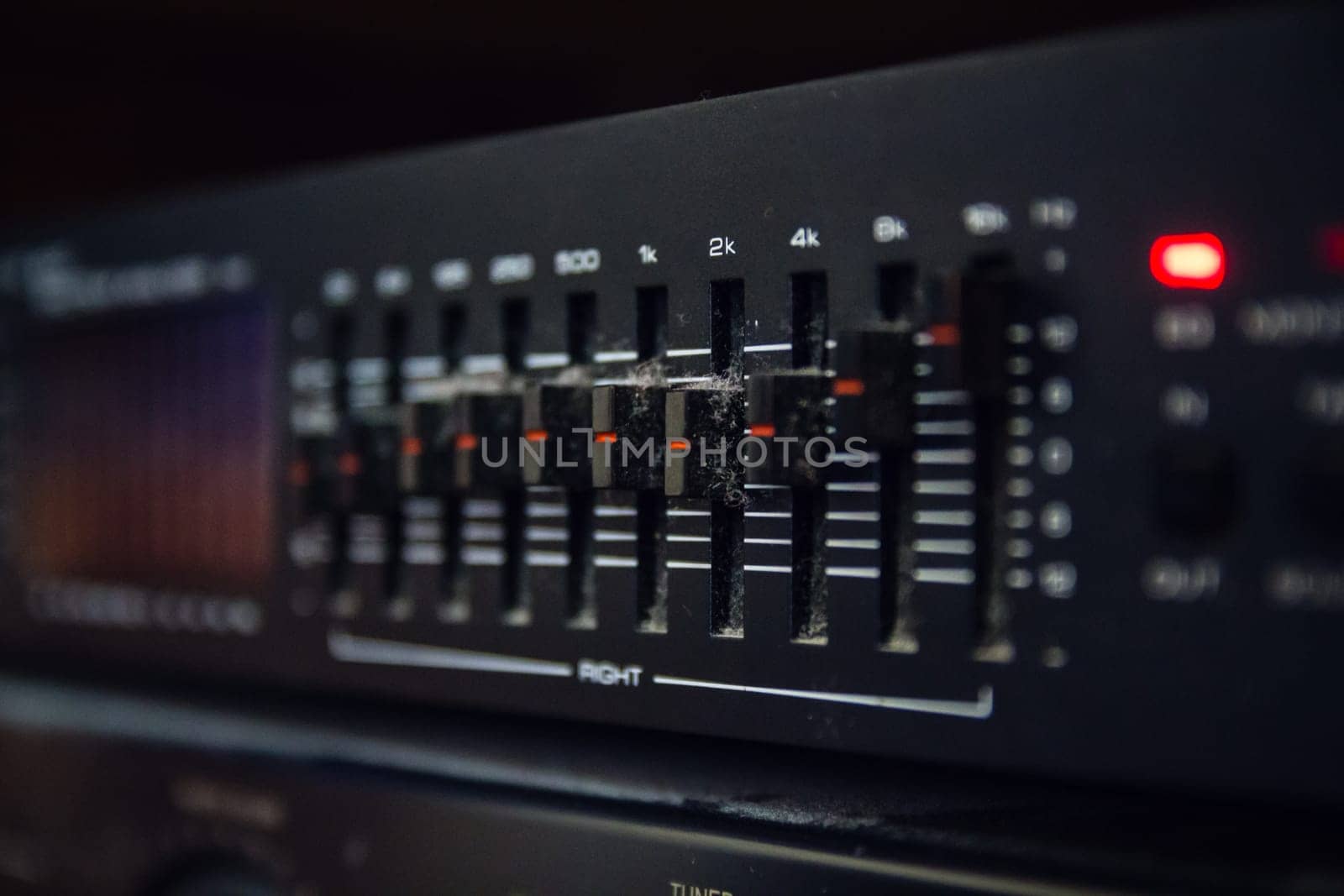 Graphic equalizer controls on an audio system - Close Up Selective Focus
