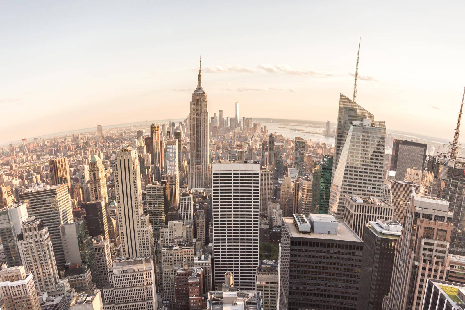 New York City skyline panorama at sunset. Fisheye lens effect