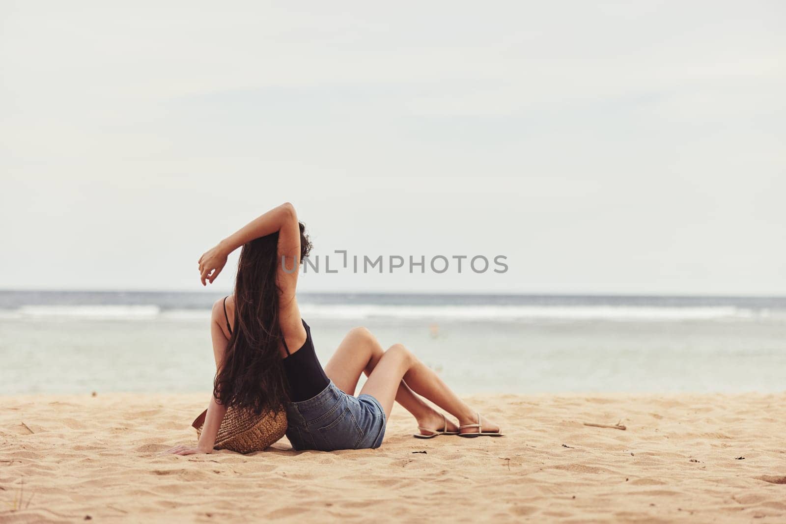 travel woman freedom vacation sand sea smile sitting beach nature ocean by SHOTPRIME