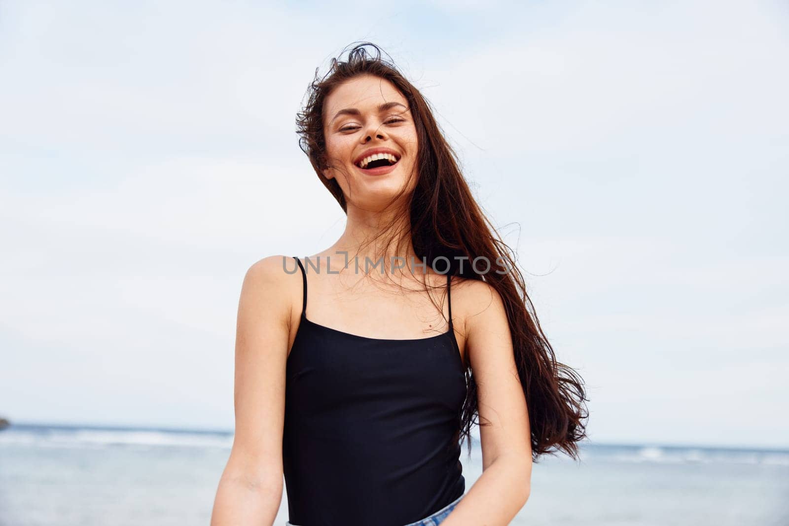 woman beach travel dress enjoyment young holiday smile running ocean sunset vacation smiling nature adult sand happy happiness sea summer coast