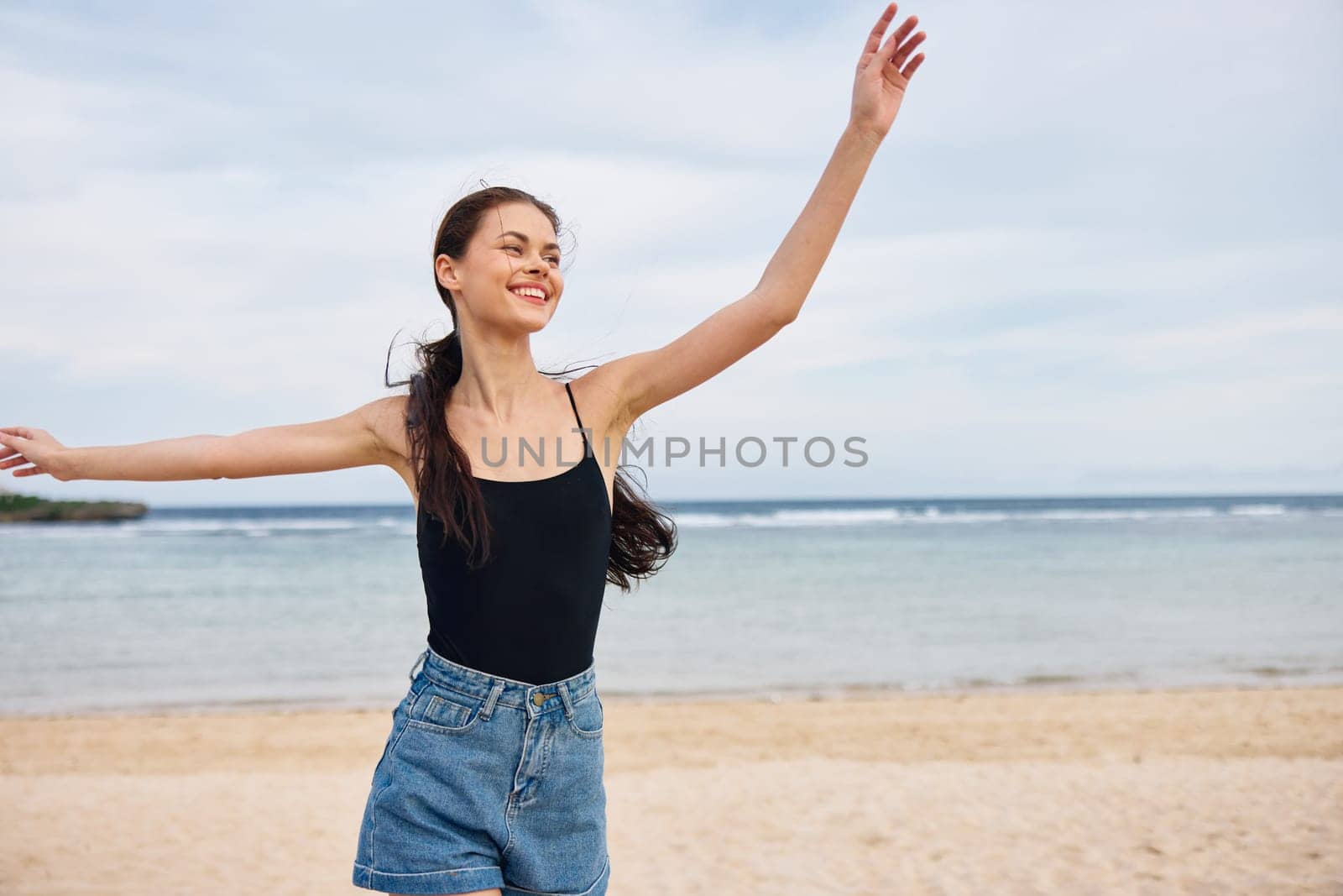 woman sunset sea lifestyle ocean travel running summer beach young smile by SHOTPRIME