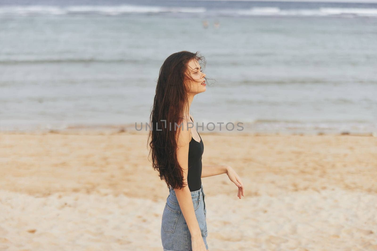 woman beautiful sand sunset smile beach ocean vacation lifestyle sea summer by SHOTPRIME