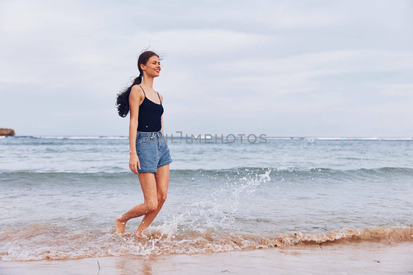 sunset woman travel young running beach lifestyle sand summer smile sea by SHOTPRIME