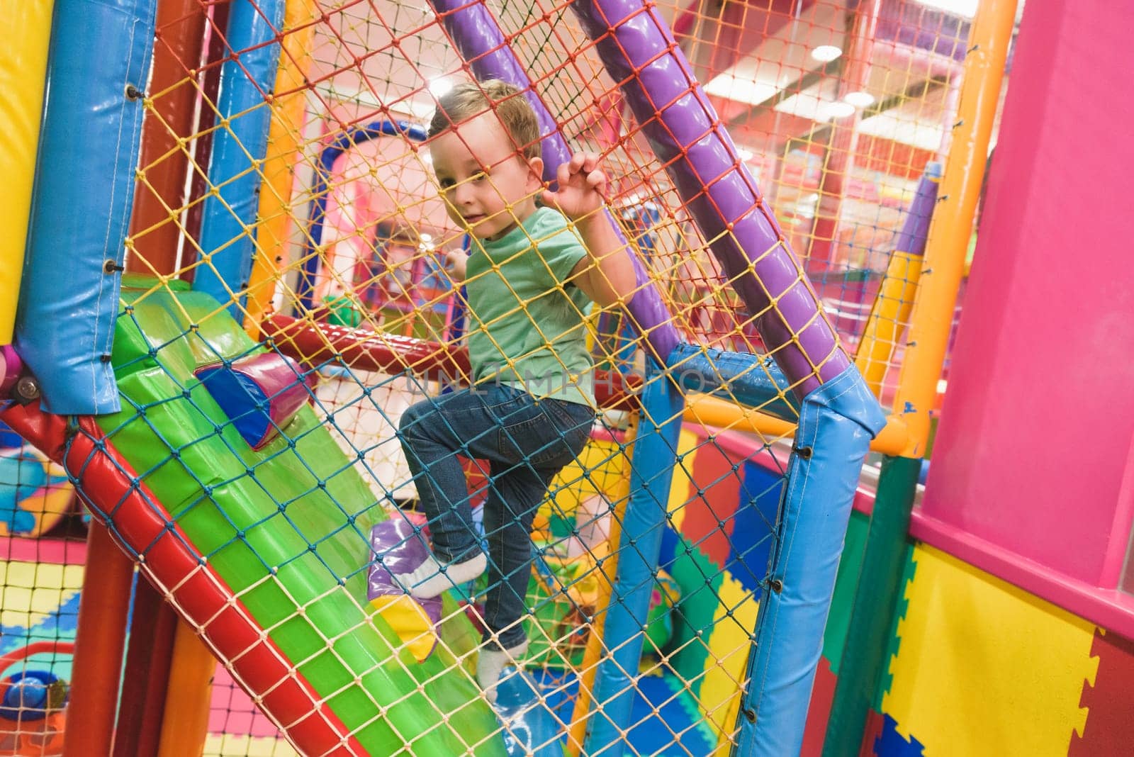 Indoor playground with colorful plastic balls for children.