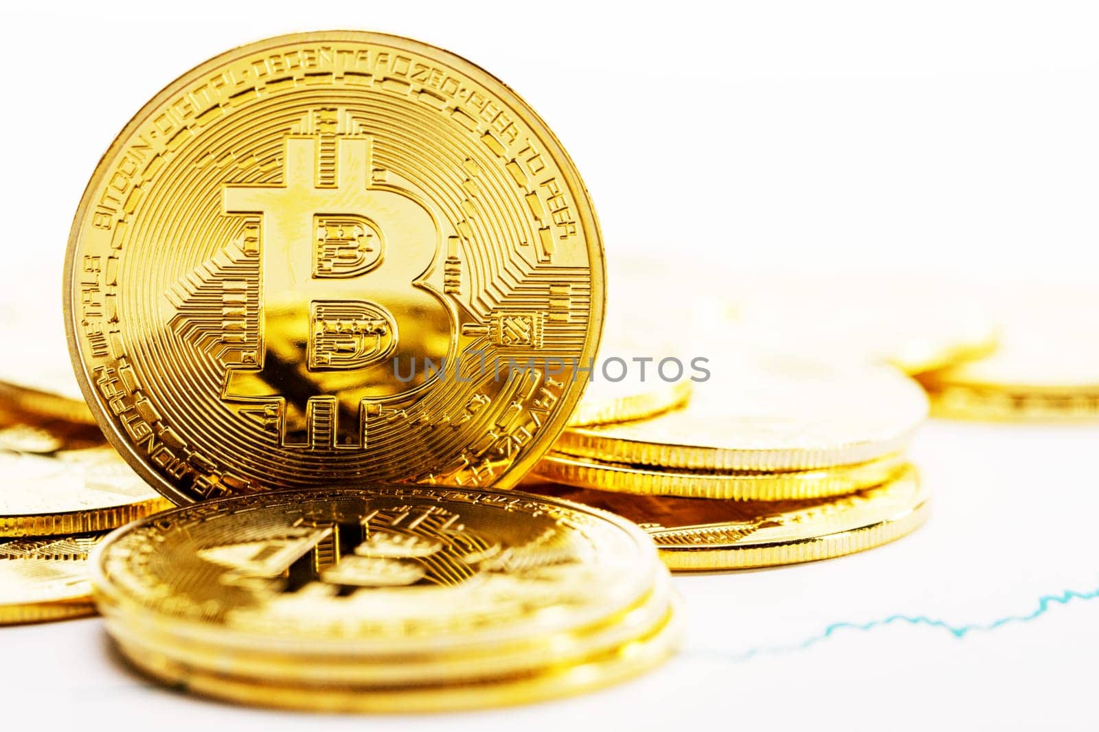 Coins with bitcoin sign and graph by Yellowj