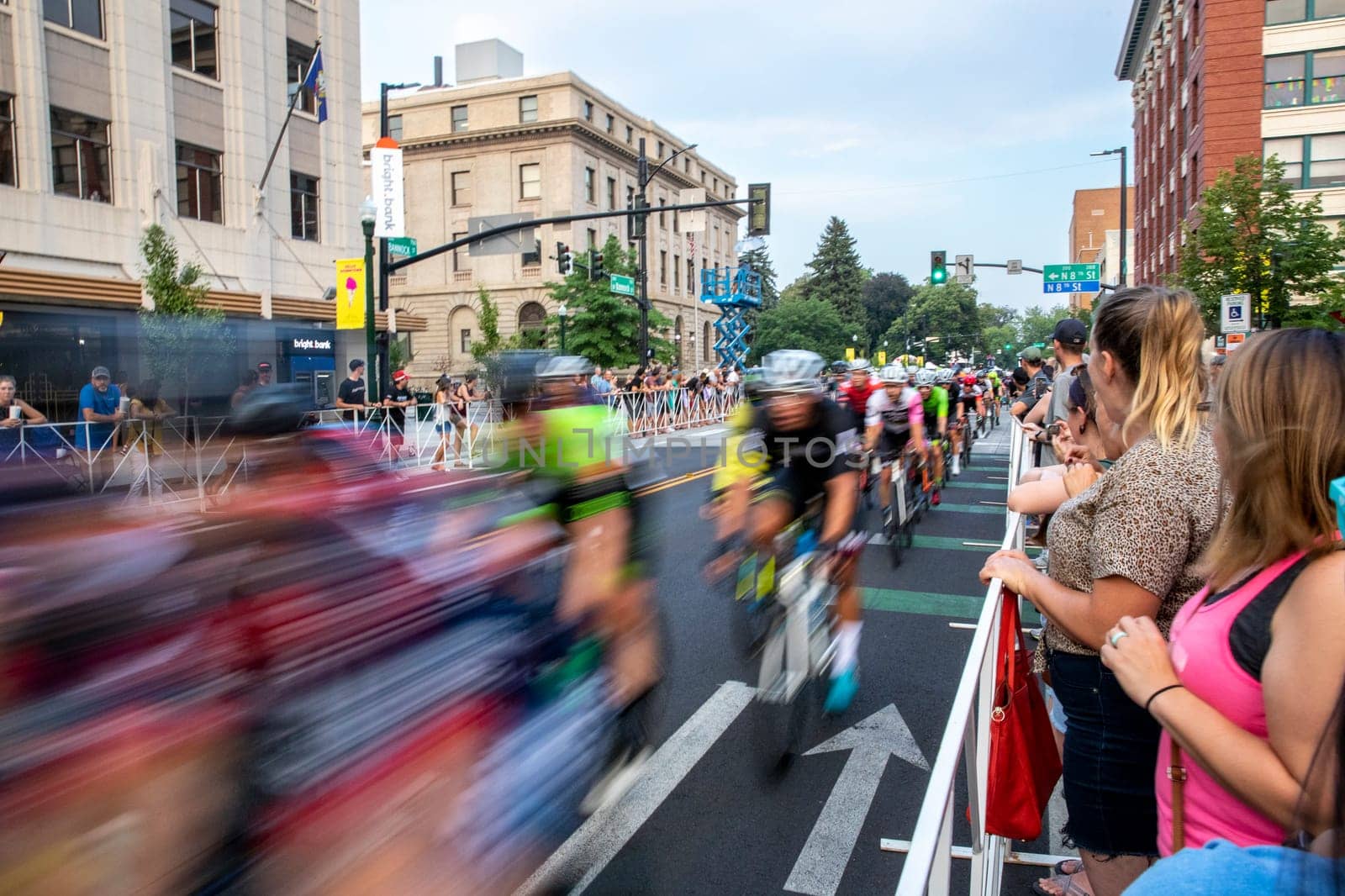 BOISE, IDAHO - July 7, 2021: Bikes racing past at the Boise Twilight Criterium