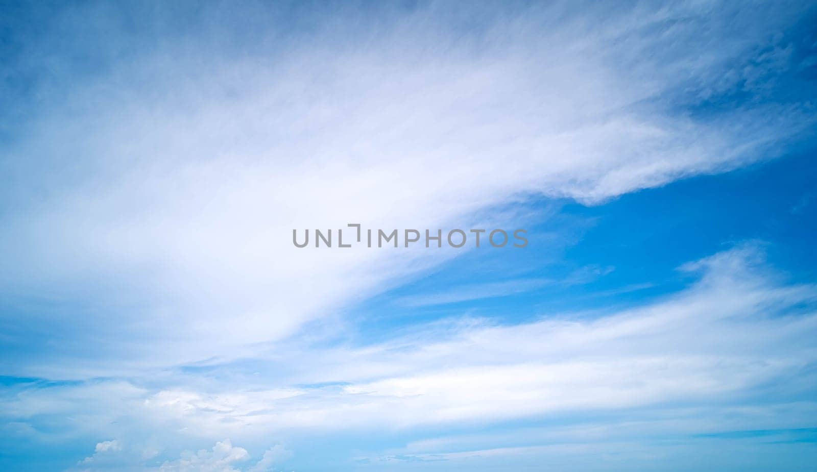 Fluffy cirrus clouds on blue sky abstract nature weather season summer by Petrichor