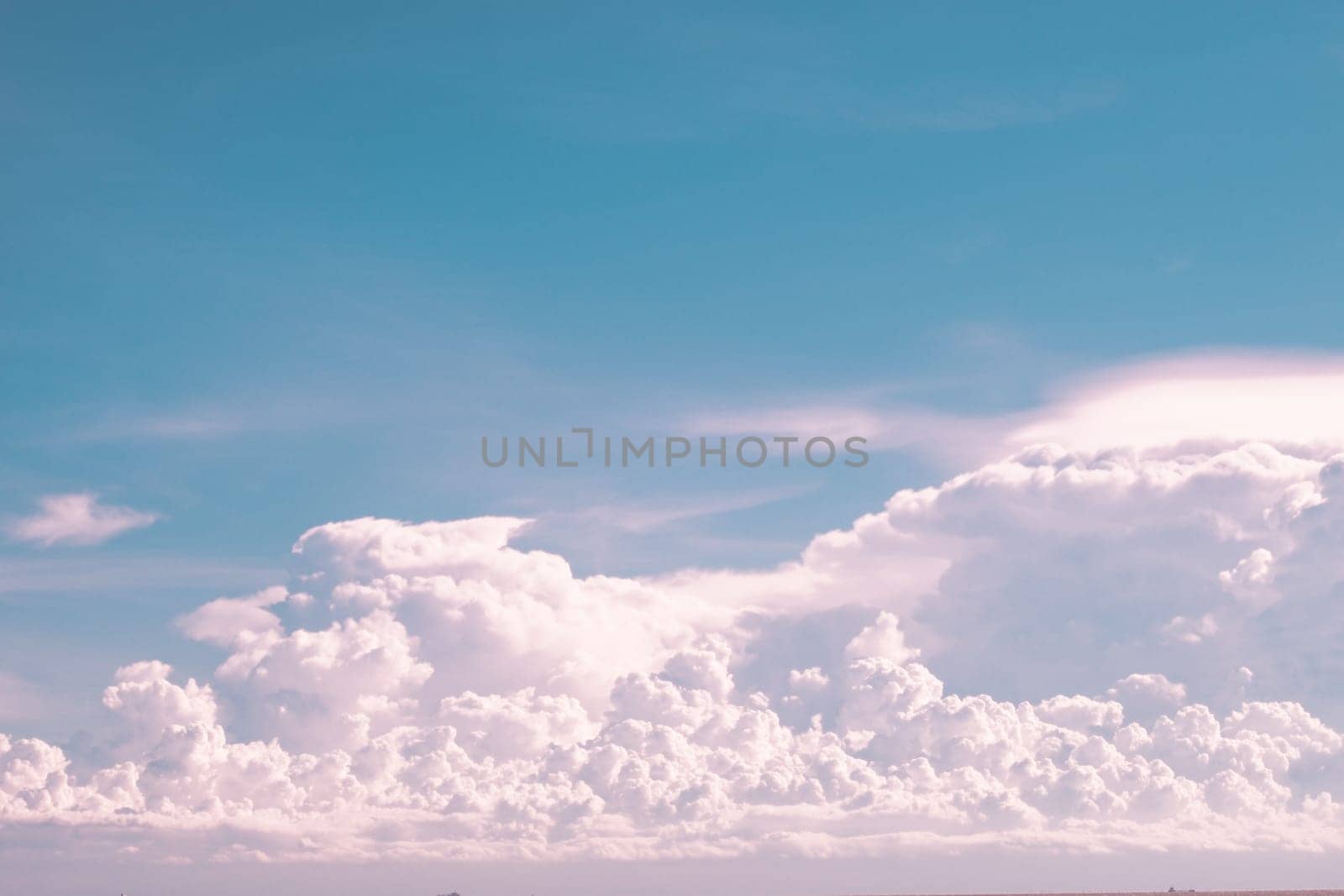 huge White fluffy cloud against  blue sky summer abstract weather background. by Petrichor