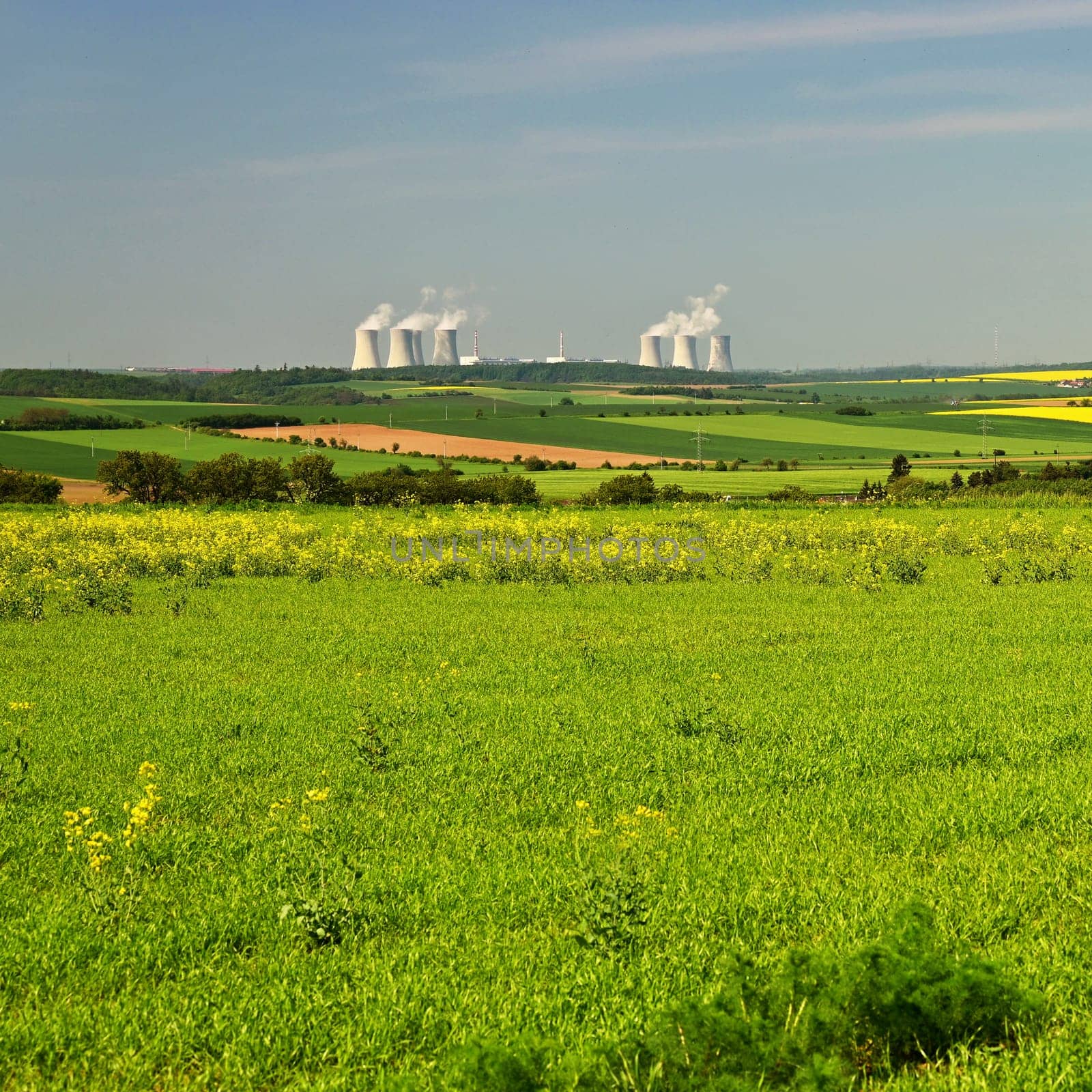 Dukovany nuclear power plant.
Blooming meadows and fields, beautiful spring landscape in the Czech Republic.