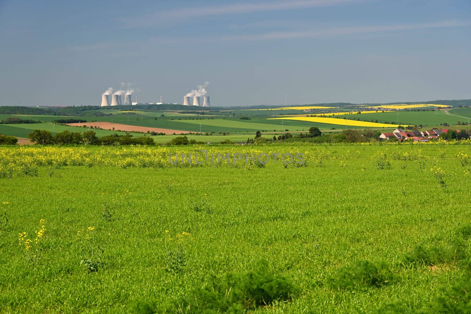 Dukovany nuclear power plant.
Blooming meadows and fields, beautiful spring landscape in the Czech Republic.