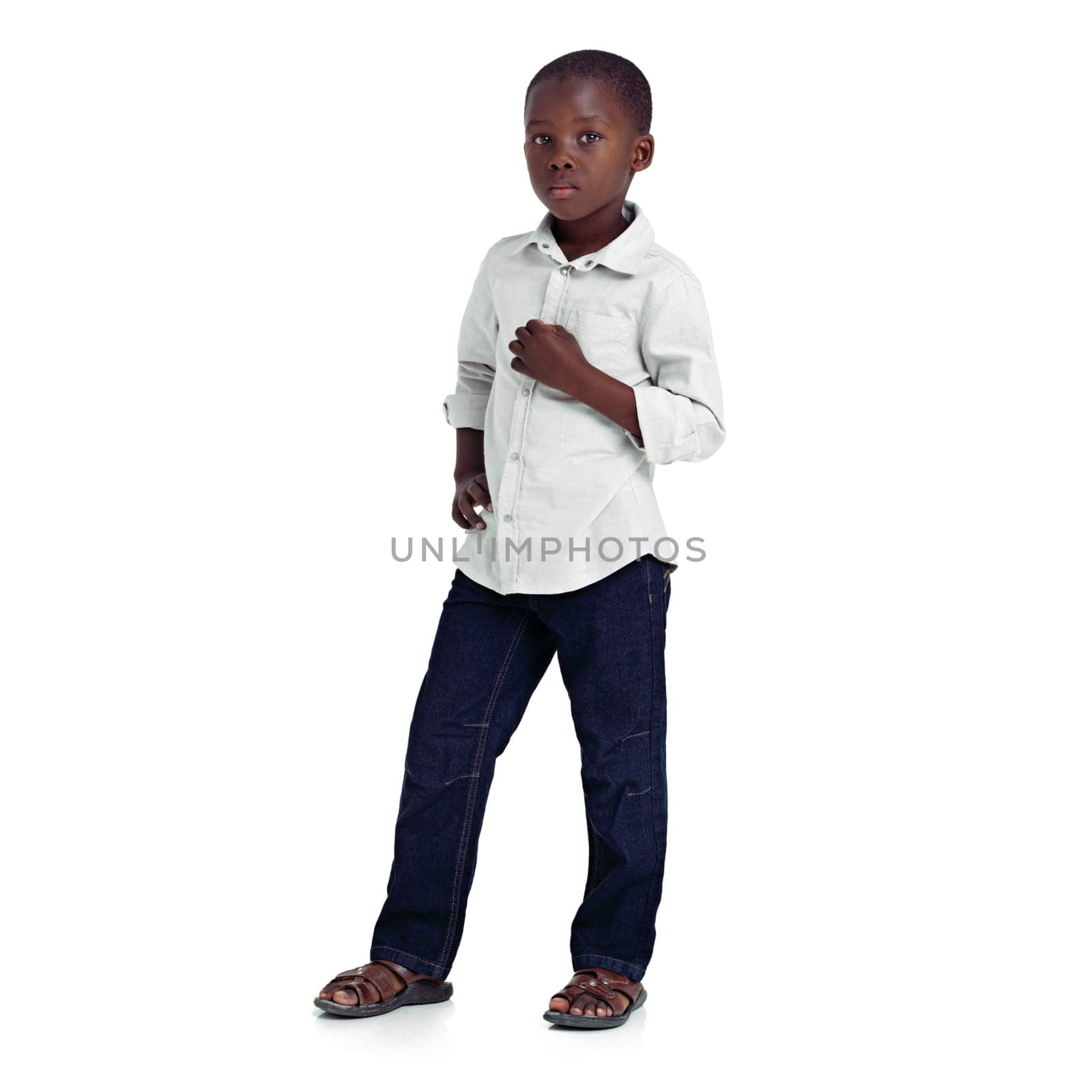 Serious about my future. Full length studio shot of a young african girl looking seriously at the camera. by YuriArcurs