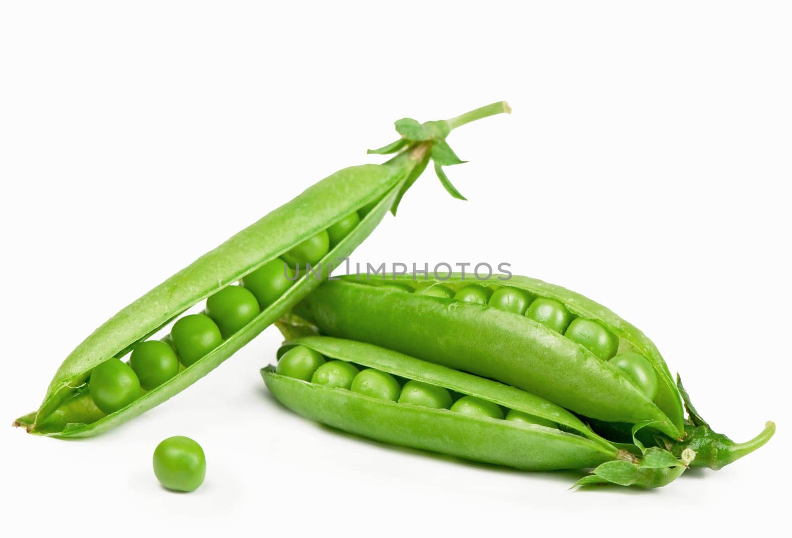 Raw green peas in pods isolated on the white background by aprilphoto