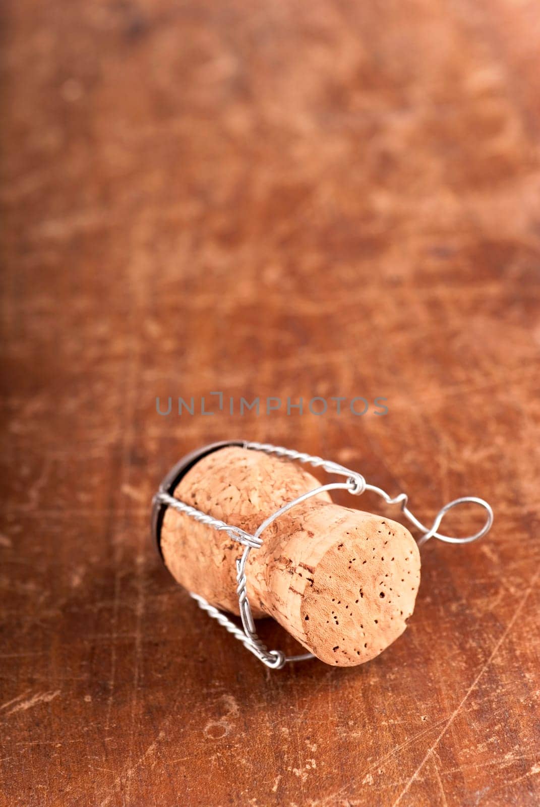 Old Dated wine bottle corks on the wooden background. Close up Vintage background with empty space for text by aprilphoto