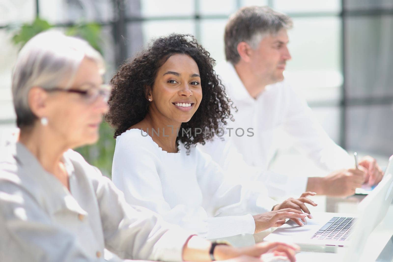 business woman in the office at work with the team.