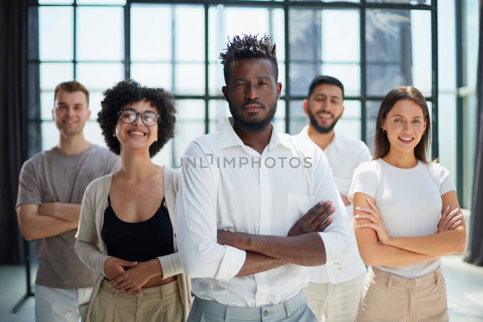 Face of beautiful woman on the background of business people
