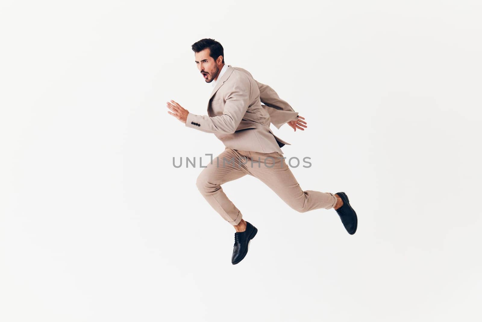businessman man running jumping winner smile stylish business isolated flying suit background arm beard fashion happy victory smiling beige sexy eyeglass