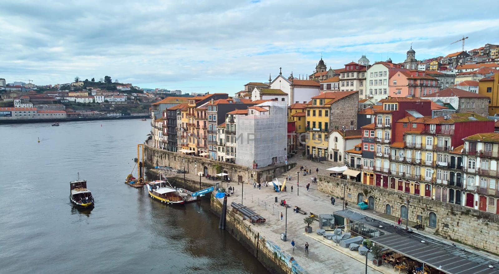 Porto, Portugal - 12.25.2022: Aerial view of the old city of Porto. Portugal old town ribeira aerial promenade view with colorful houses. by driver-s