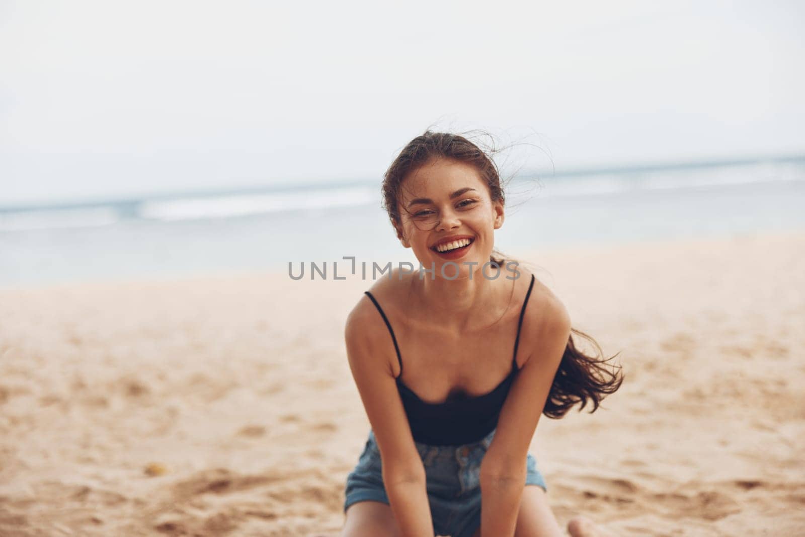 woman sand smile freedom travel vacation nature sea sitting ocean beach by SHOTPRIME