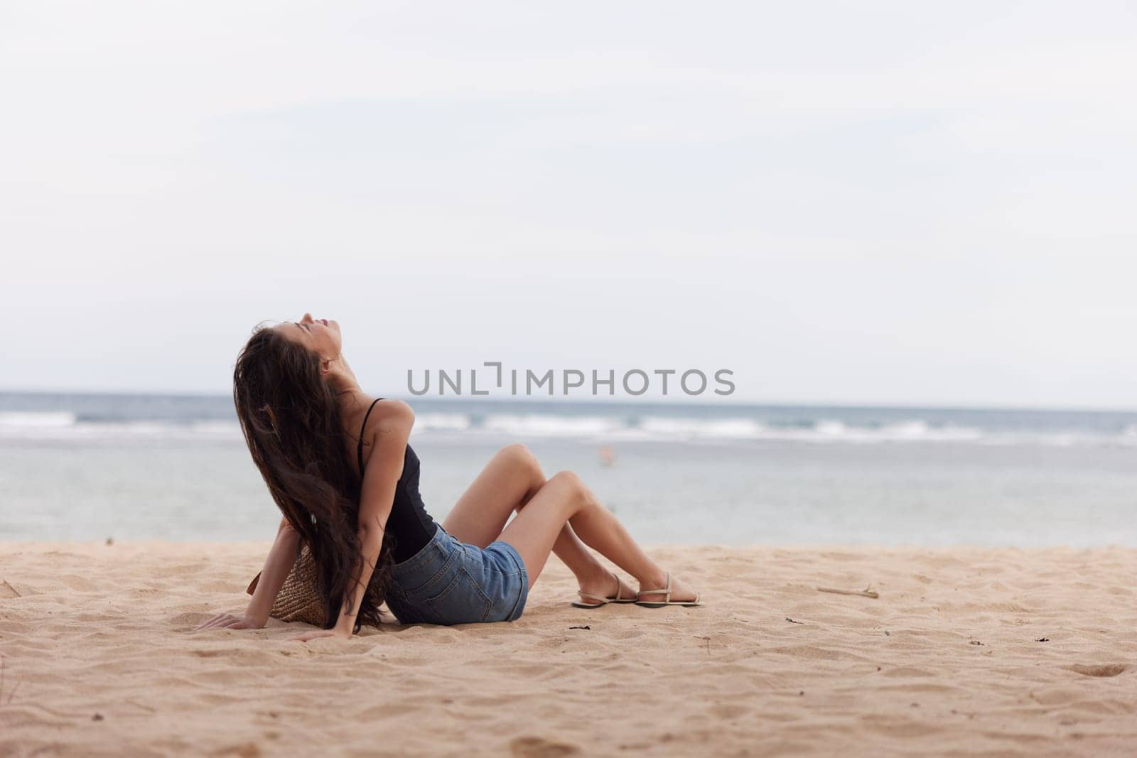 woman tan nature sea freedom vacation beach smile travel sand sitting by SHOTPRIME