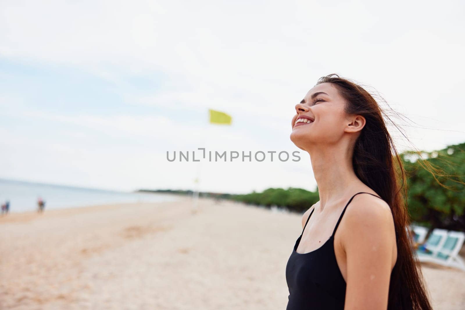 woman nature smiling sky young travel smile sand adult ocean beauty vacation holiday free tropical leisure beautiful running sea summer beach