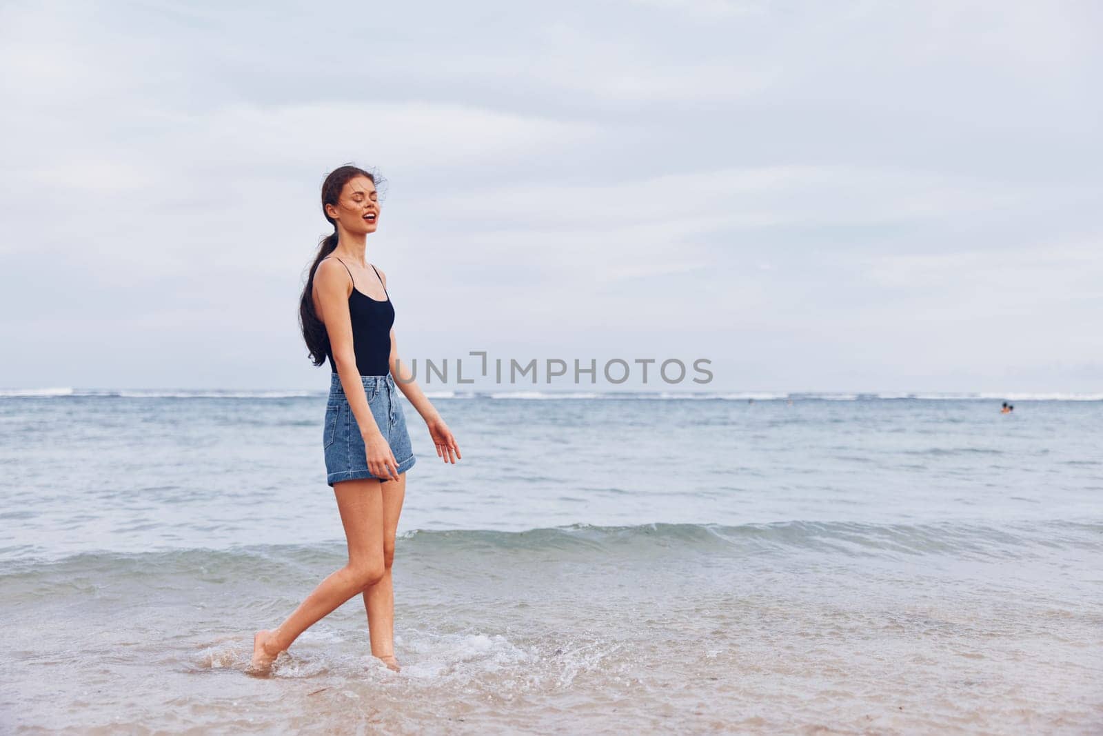 woman running sunset summer hair long beach lifestyle travel smile young sea by SHOTPRIME