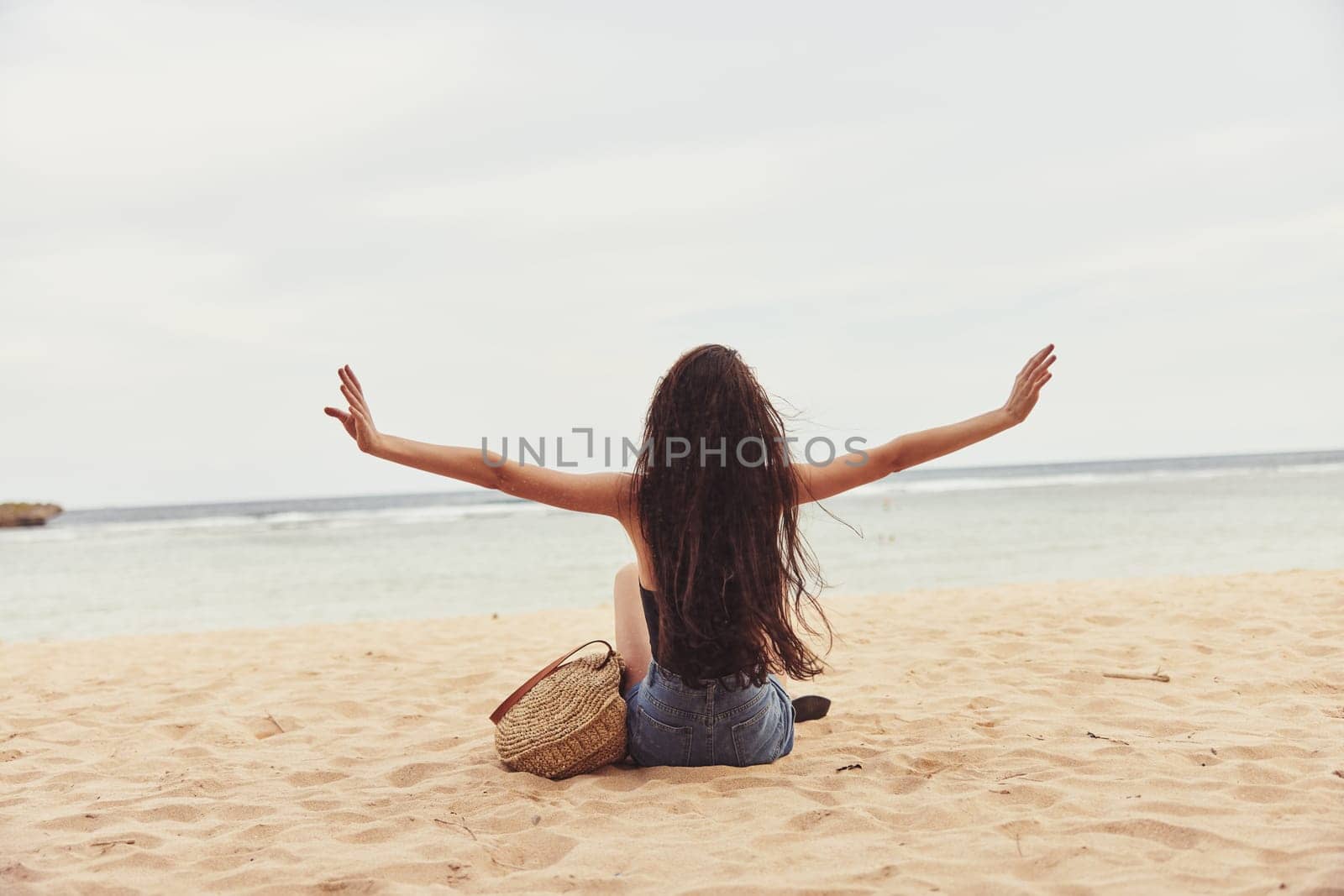 sand woman sea summer travel vacation nature beach smile freedom sitting by SHOTPRIME