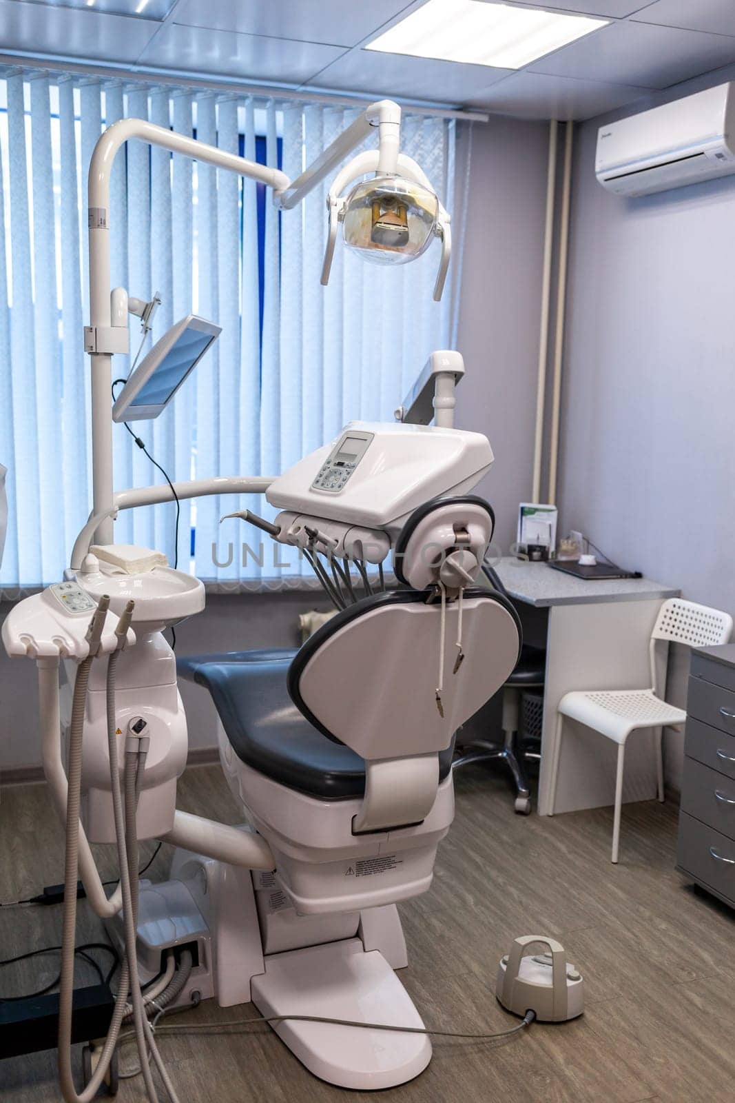 Dental interior office with modern equipment. Modern dental practice. by AnatoliiFoto
